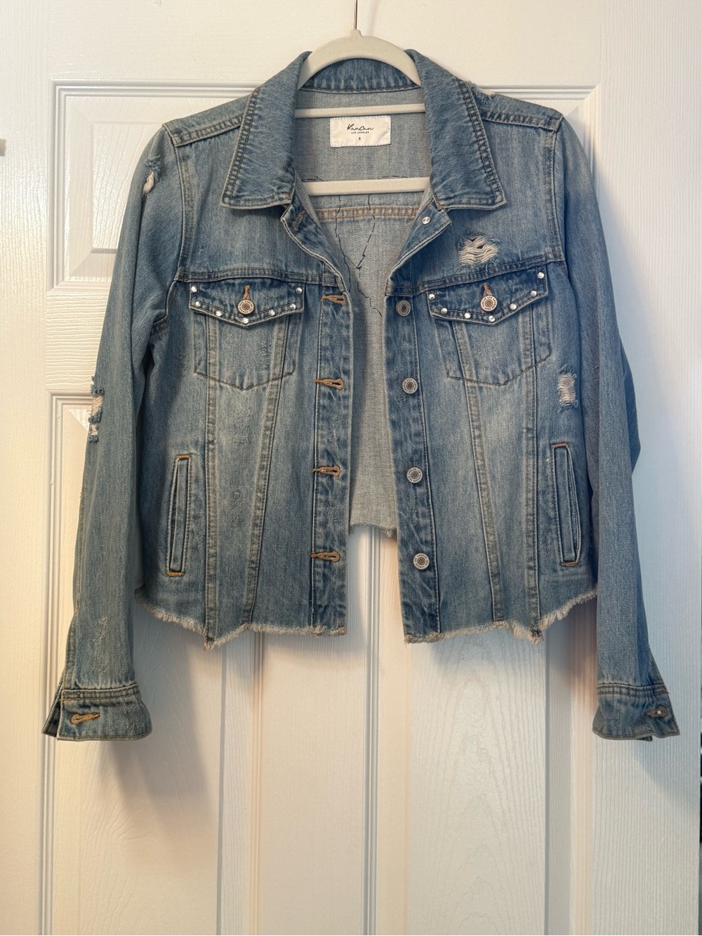 KanCan Distressed Cropped Denim Jacket with Sequin Angel Wings